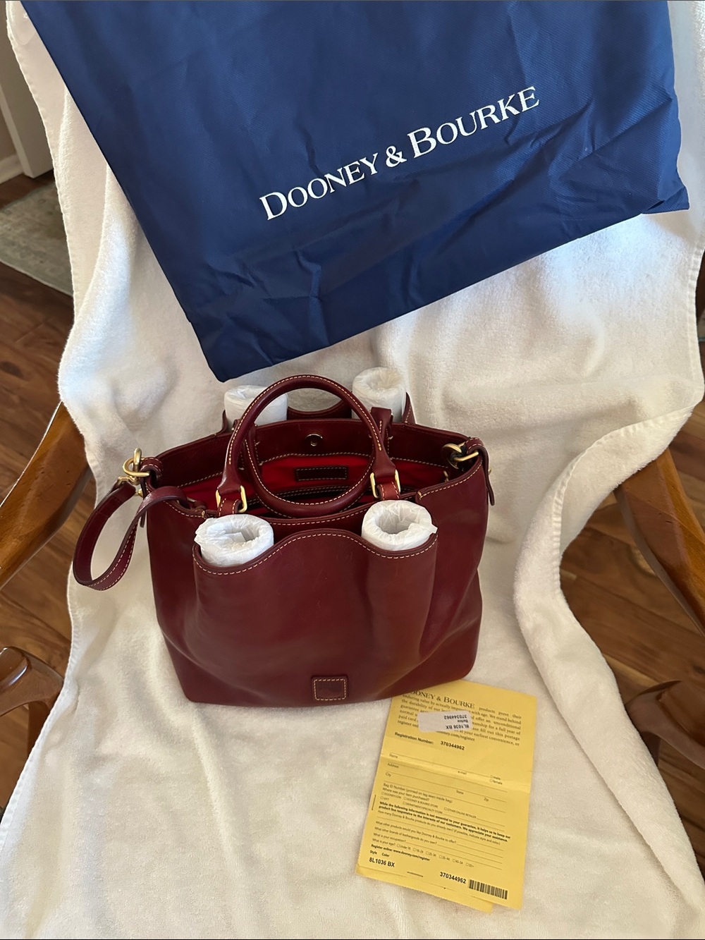 Dooney & Bourke  Beautiful Bordeaux Leather Barlow with Gold Hardware